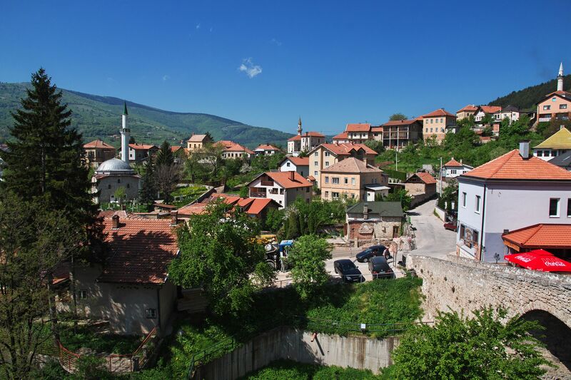 View over the traditional red-roofed houses and mosques in Travnik.