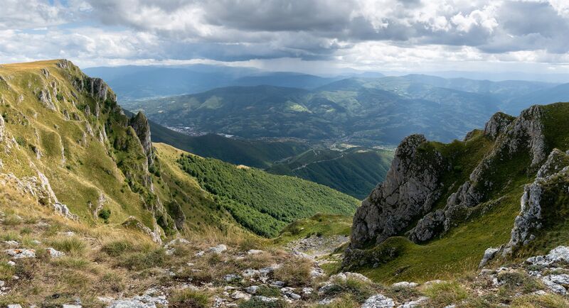 Panoramic view from Mount Vlašić overlooking the surrounding hills and valley.